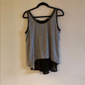 Gray tank top with a mesh black back